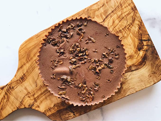 Delicious mini raw chocolate cake open box